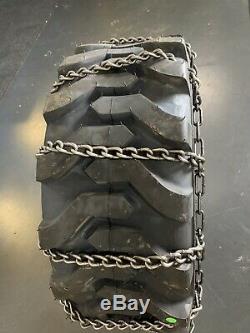 2 NEW- 10-16.5NHS SNOW TIRE CHAINS with 2 EXTRA cross Chains 6-4