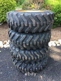 4 NEW 10-16.5 Skid Steer Tires/wheels for R-Series Bobcat S64, S62 Camso sks332