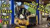 Tilting The Cab On A New Holland Lx565 Skid Steer
